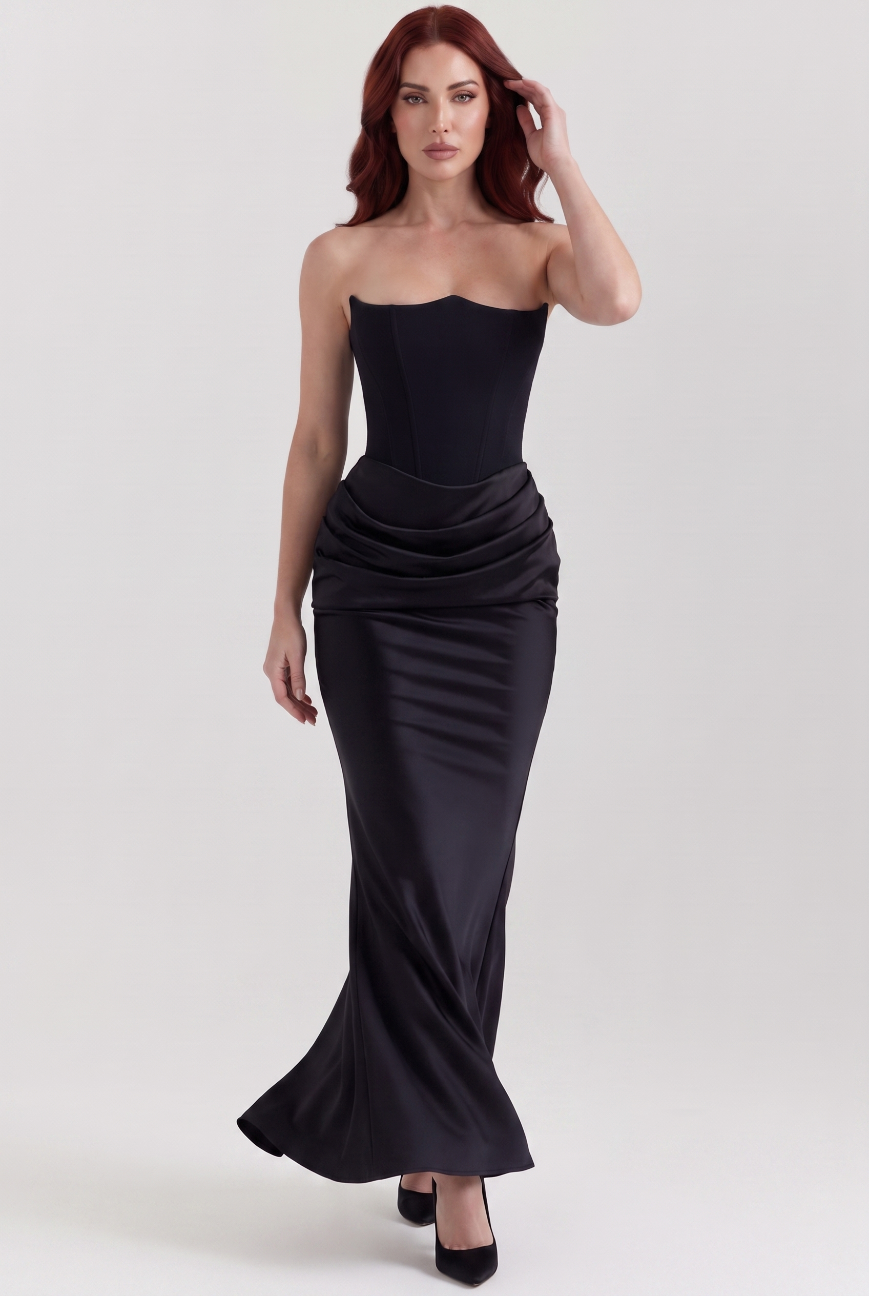 Black Strapless Corset Maxi Dress with Draped Satin Skirt - Front View in Motion